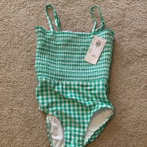 NEW! Never worn, tags on. Old Navy, girls size M (8) bathing suit.